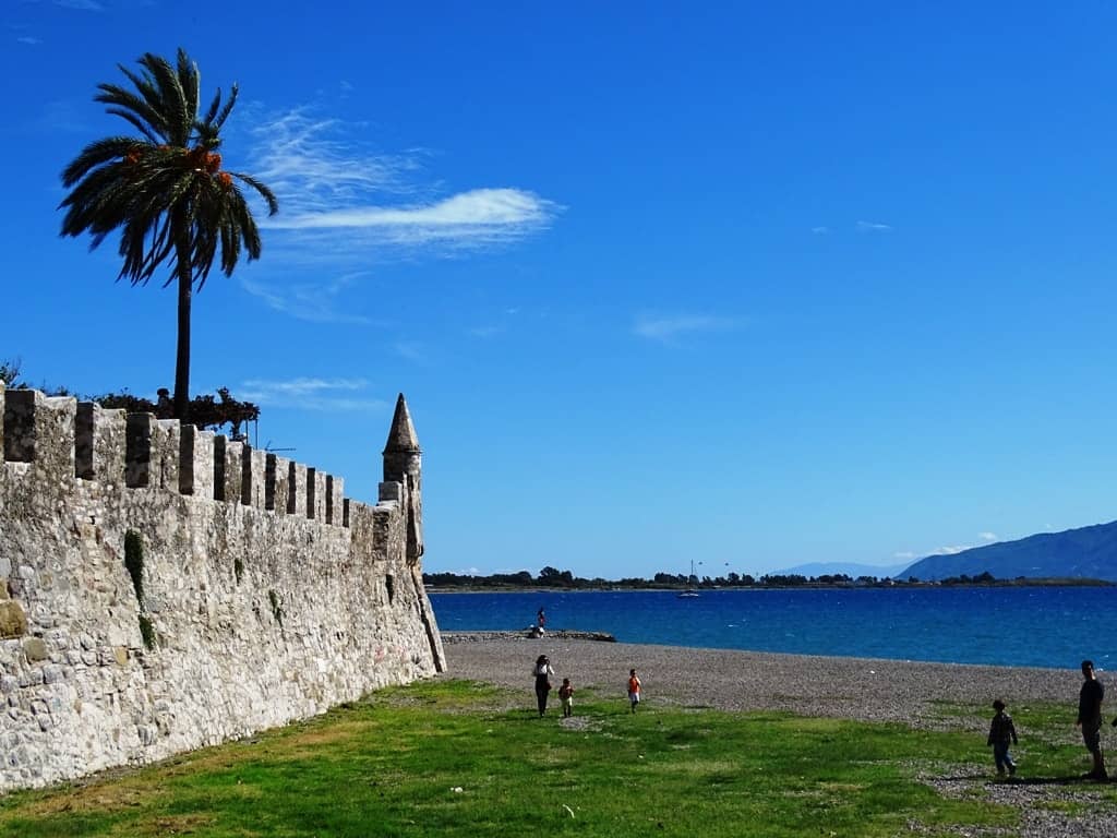 the beach by the fortifications of the castle - nafpaktos