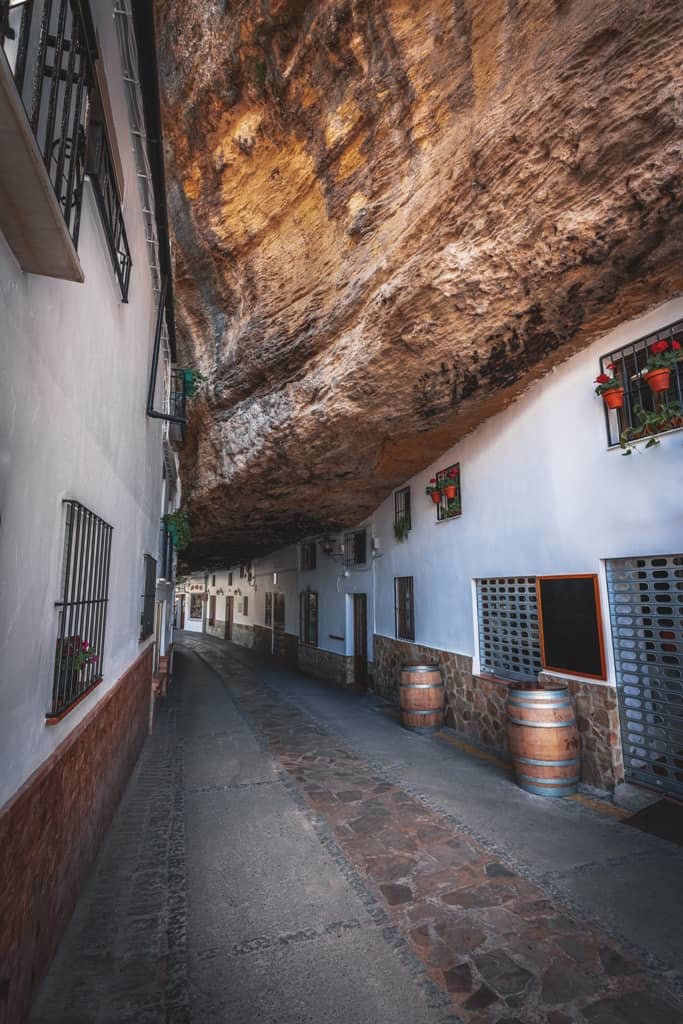 Houses built into rocks at Cuevas de la Sombra Street - Setenil de las Bodegas,  Andalusia, Spain